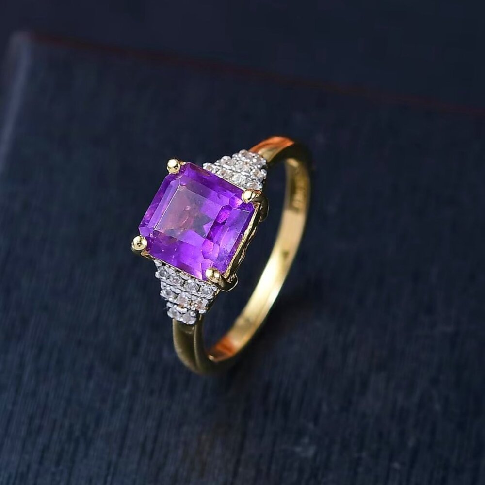 Artisan Gold Ring with Purple Center Stone and Clear Accents